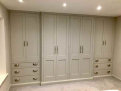 Eight door double fronted wardrobe with drawers